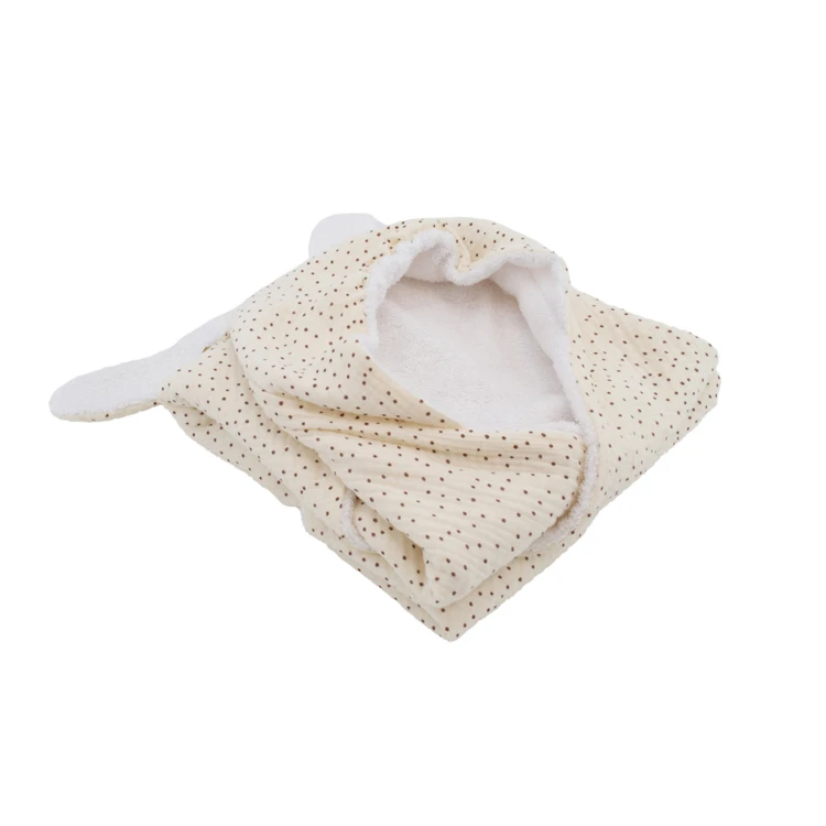 Sortie de bain bébé en mousseline à pois avec capuche