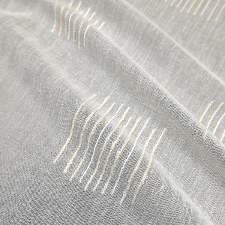 Tissu voilage jacquard à motifs lignes en relief et bas plombé