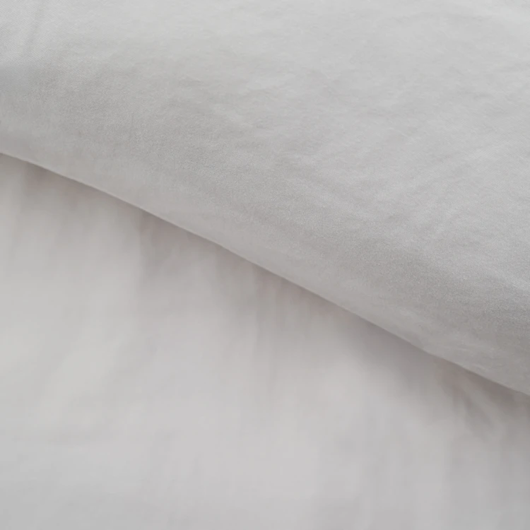 Parure de lit 3 pièces en microfibre unie lavée housse + taies